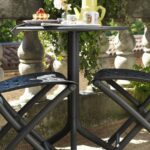 Spritz Patio Table (Pictured in Charcoal on Patio)