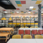 Bit Chair 8 Indoor cafeteria with Bit Chairs in Coral Red & Mustard Yellow