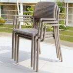 NARDI Bora Arm Chairs in Taupe stacked together on balcony