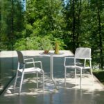 NARDI Bora Arm Chairs in White with Step Table on balcony