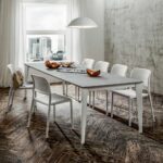 NARDI Bora Bistro Chairs in White indoors at dining table