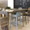 Faro Tall Bar Stools in Taupe, Blue and Havana Colours, Costa Chair on the side (Pictured in Cafe Setting with Wooden Bench)