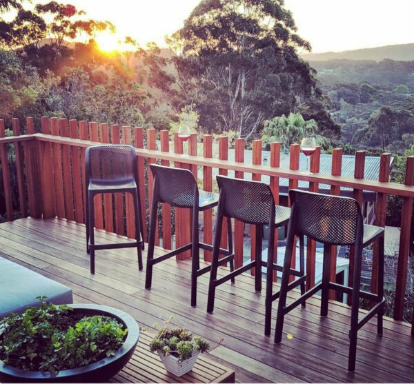 NARD Net Kitchen Counter Stools in Charcoal Outdoors on Deck at Sunset