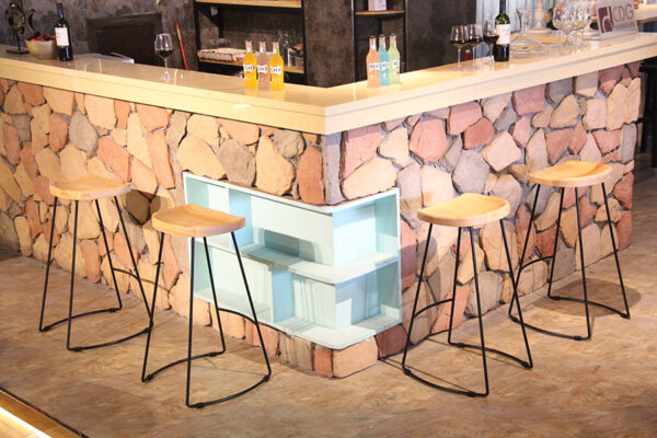 ByDezign Tractor Seat Wire Bar Stools at Corner Bar